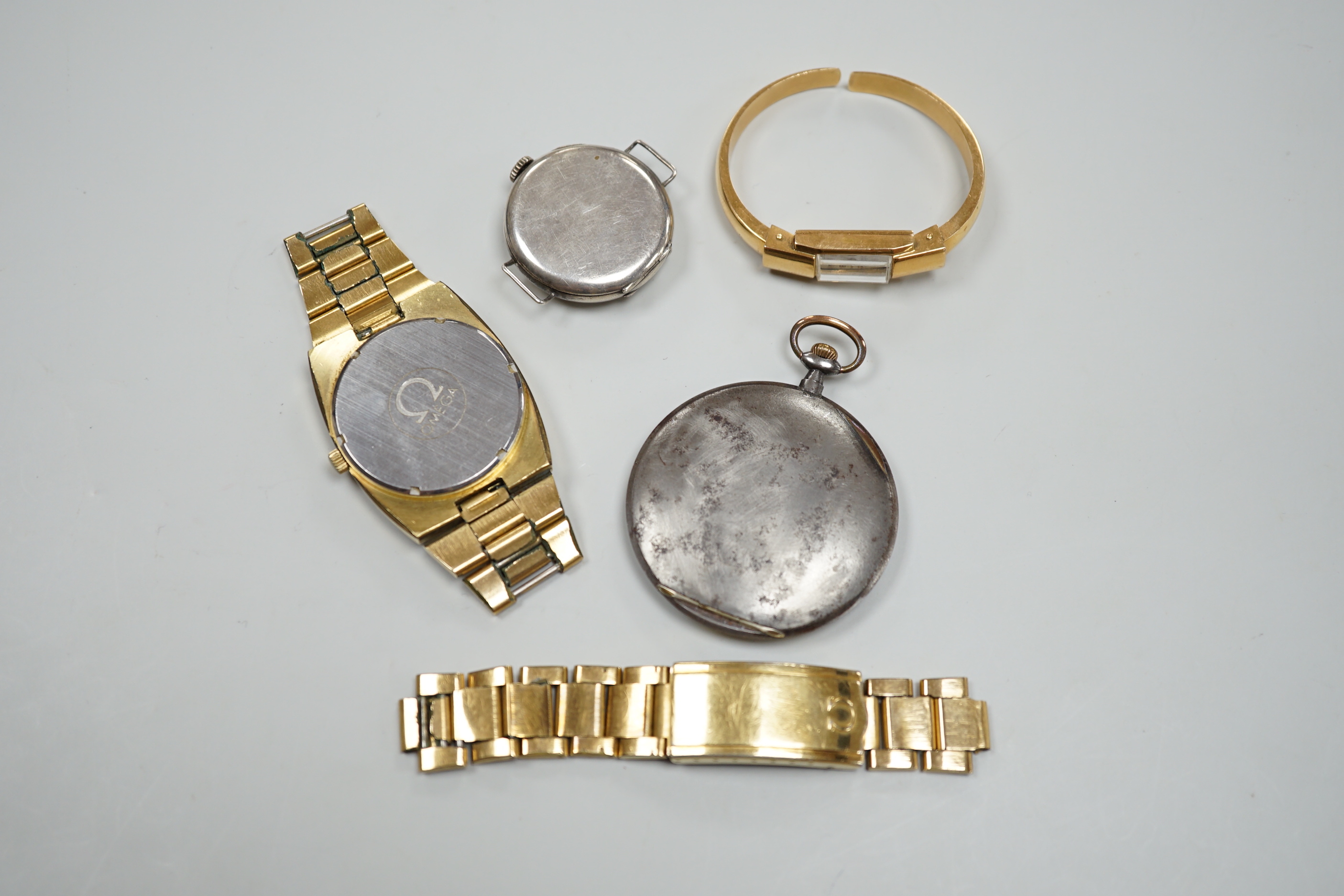 A George V silver pocket watch with arabic dial, 3.25cm, a gentleman's gold plated Omega Automatic wrist watch with loose bracelet, a gun metal dress watch and a Surena gold overlaid cocktail watch